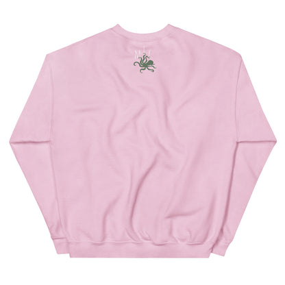 Pink sweatshirt with a small green graphic of the mama love crafts logo on the back against a white background